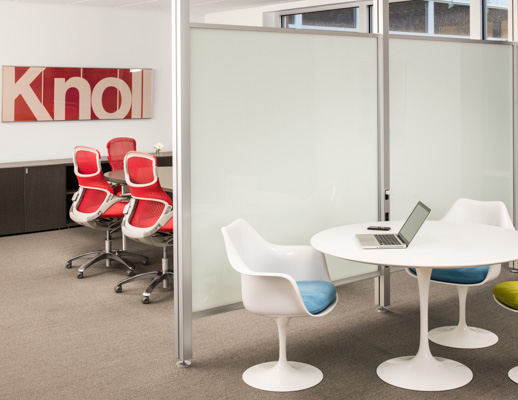 Knoll Activity Space with white Saarinen Tulip Table and arm chairs