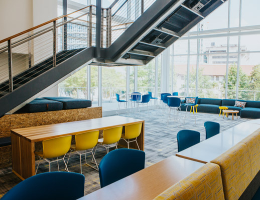 community shared spaces rockwell unscripted occasional tables bertoia molded shell stool muuto connect sofa muuto around coffee table education