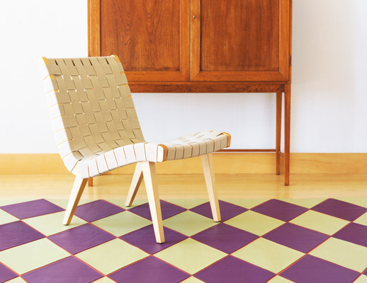 Risom Armless Lounge Chair in clear maple with neutral webbing